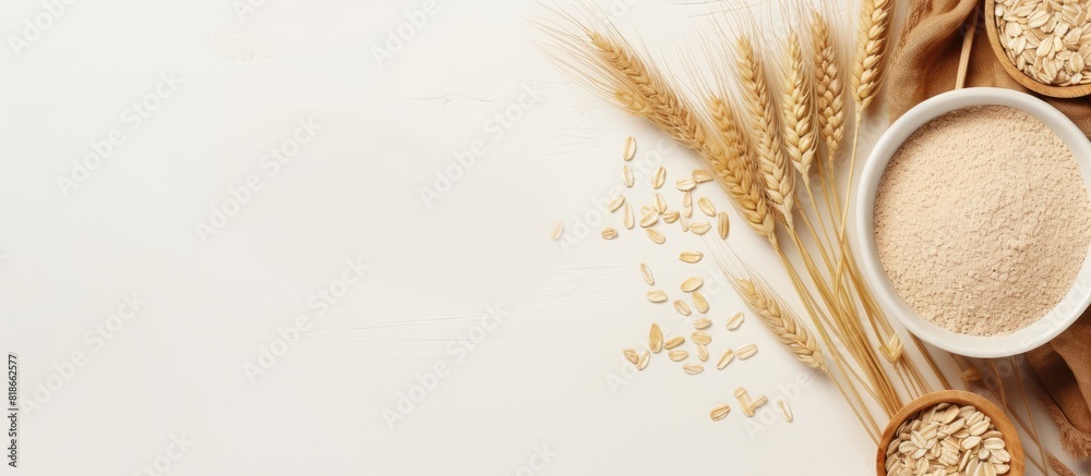 Poster Copy space image of a bowl filled with dry oatmeal adorned with ears of wheat resting on a light background This visually captures the concept of cooking oats porridge in a compelling flat lay composi