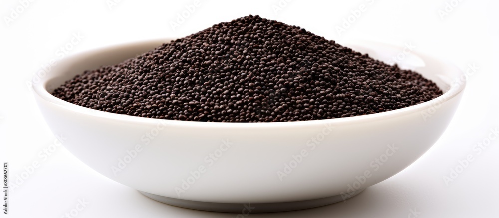 Poster Close up image of a bowl containing whole grain black quinoa isolated on a white background with ample copy space