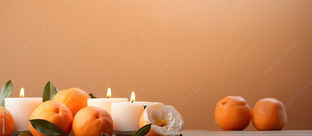 Aufkleber A new year concept with tangerines candles and a peach background with copy space image