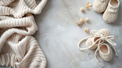 Baby shoes and teethers. Organic newborn accessories. copy space