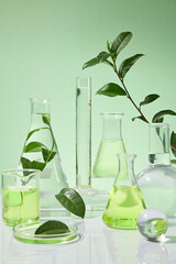 Many different experimental tools are neatly arranged on a white table that stands out against the...