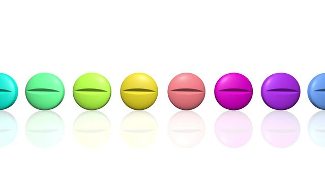 eine endlose Reihe bunter Tabletten rollt vorbei
