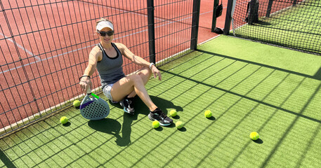 Woman players serving ball. Young adult girl play tennis outside arena. Person racket beat game club. People group hit sport court match. Fit care free time. Run skill train. Padel tennis team workout
