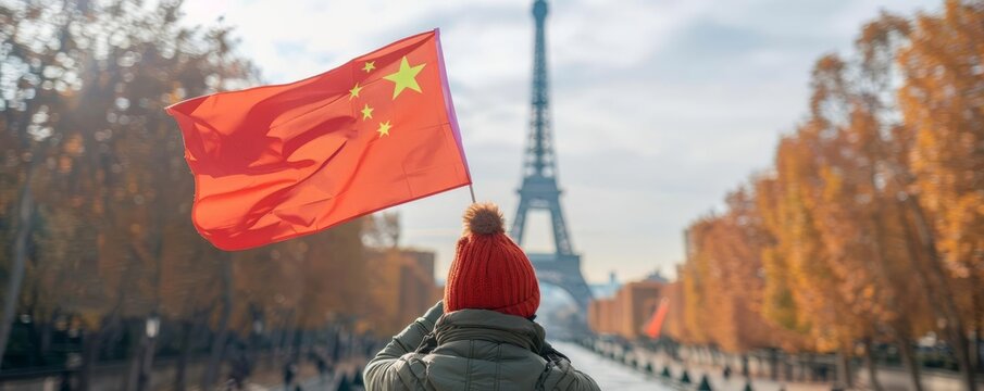 Olympic Paris sport Focus on a hand holding the China flag