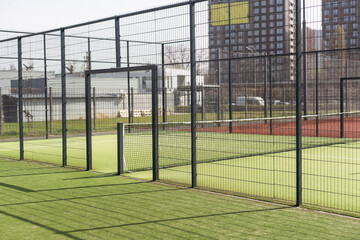 Tennis net on a green field
