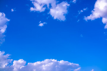 Clouds against the blue sky close-up. Changes in weather during the rainy season. Thunderclouds,...