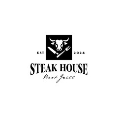 Steak logo with a cow's head design, knife and fork as a symbol for the restaurant