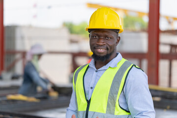 Cheerful engineer man take a break in the precast factory site, Foreman worker at the construction...