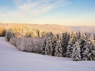 Scenic view of a foggy winter sunrise in Gmundnerberg, Salzkammergut, Austria