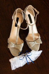 Pair of bridal shoes ornate with crystal on the wedding day