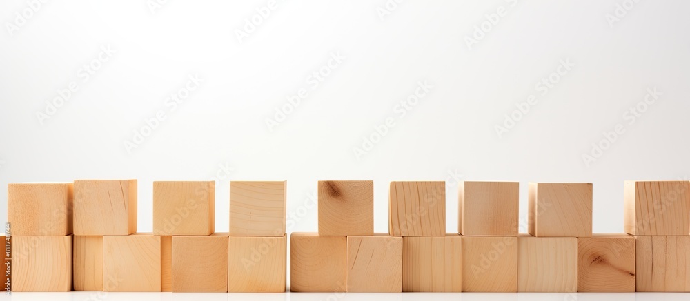 Poster a copy space image featuring square wooden blocks on a white background