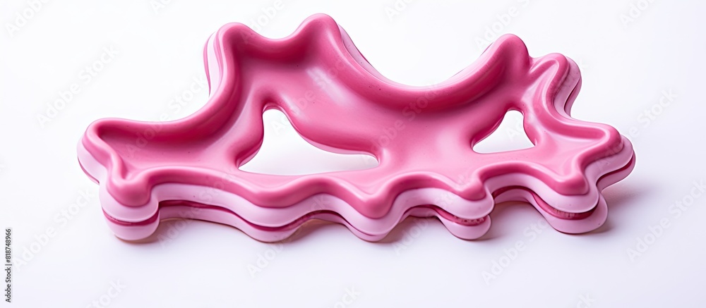 Aufkleber A pink cookie cutter can be seen on a white background in this image that has copy space