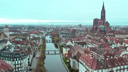 Drone footage of the buildings and bridges on Muhlwasser river in Strasbourg, France