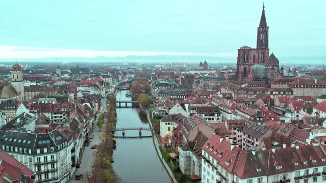 Drone footage of the buildings and bridges on Muhlwasser river in Strasbourg, France