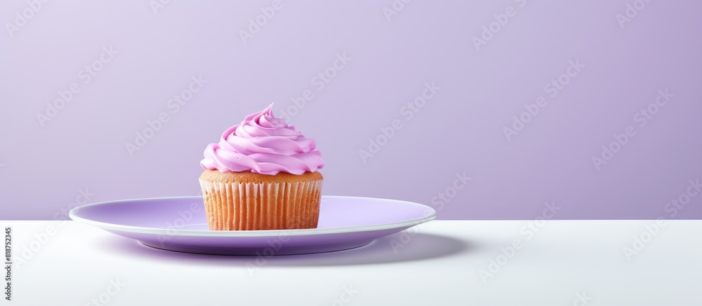 Poster a delectable violet cupcake on a plate with a blank space for an image. creative banner. copyspace i