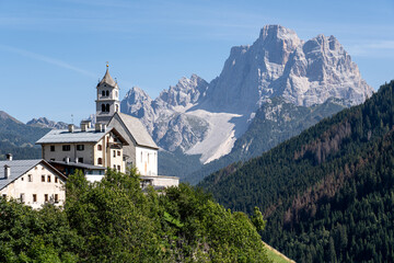 Scenic view of Santa Lucia Church in the breathtaking Dolomite Mountains of South Tyrol, Italy