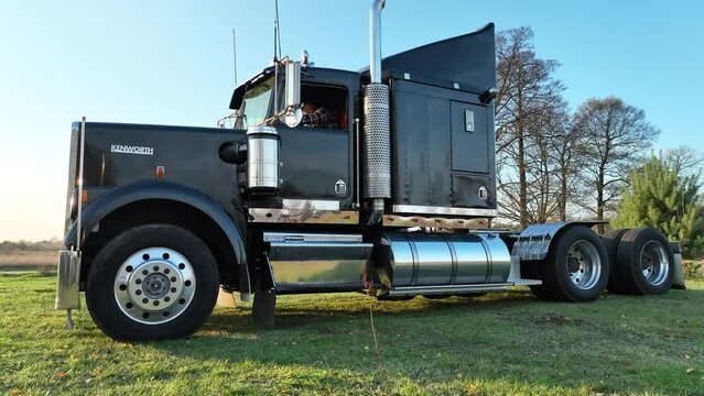Large American Semi Truck Parked in Field
