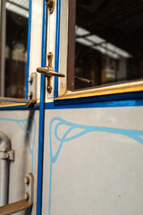 Close-up shot of an old train door handle