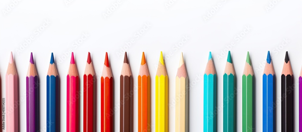 Poster a vibrant assortment of colored pencils on a blank white backdrop providing ample blank space for ad