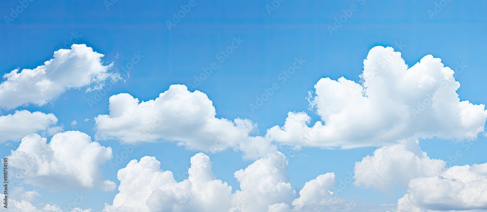 Aufkleber copy space image featuring a serene blue sky adorned with fluffy white clouds
