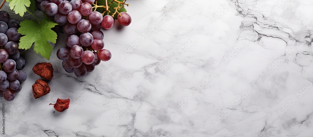 Aufkleber A top view of wine and grapes on a grey marble background with ample copy space for additional elements or text