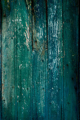 Bright green wooden textured surface with hints of rust