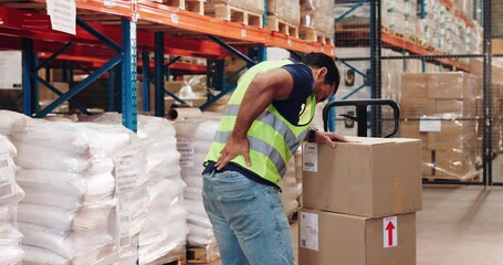 Man, logistics and warehouse with back pain of boxes, heavy lifting and manual handling for loading or packing. Person, strain and injury in factory for sorting for supply chain and distribution.