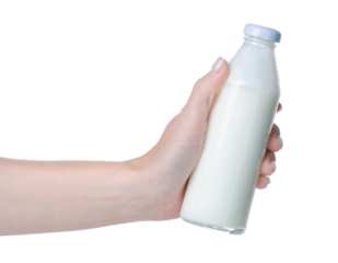 Glass bottle of kefir in hand on white background isolation