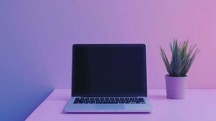 A laptop is open on a table next to a small plant. The scene is simple and minimalistic, with the focus on the laptop and the plant