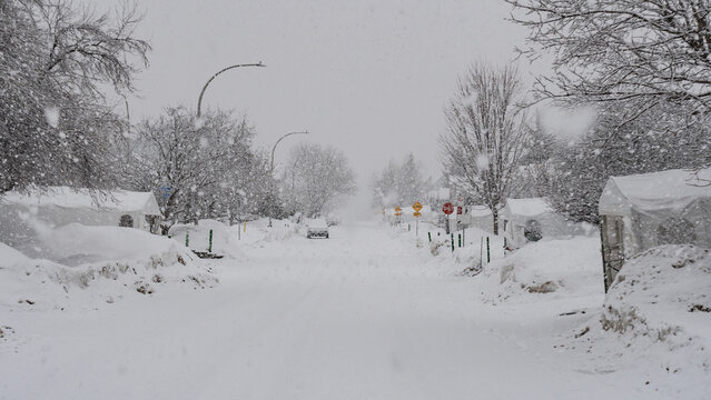 Big snowstorm in a residential area.