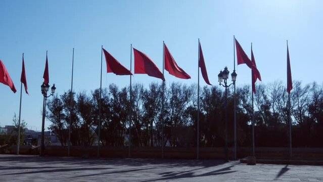 Row of Moroccan flags fluttering in Casablanca.