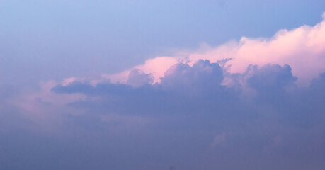 Blue sky with pink clouds