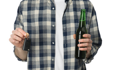 Man with bottle of beer and car keys on white background, closeup. Don't drink and drive concept