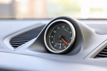 Tachometer inside of modern car, closeup view