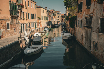Residential Canal with Parked Boats in Venice, Italy