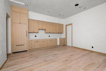 a large kitchen is being remodeled and white walls are in the background