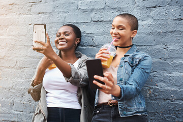 Online, friends and selfie on social media in city with coffee break and gen z influencer post to...