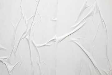 Naklejka premium white crumpled and creased glued wrinkled paper poster texture background