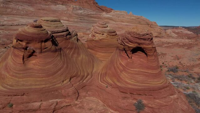 Drone footage of the Coyote Buttes North (Mini Wave) on a sunny day in Arizona, United States