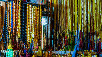 Muslim prayer beads ( tesbih ) in different patterns and colors.