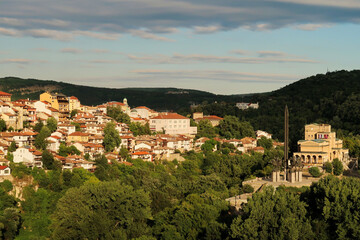Spectacular view onto the old town and the Monument to the Asen, Assen Dynasty at sunset, Veliko...