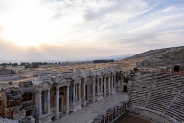 Obraz premium Ancient amphitheater, hierapolis city in Pamukkale near wonders of Turkey and travel attractions. Hierapolis/Pamukkale/Denizli