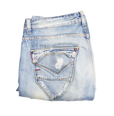 Folded blue jeans on a white background, showcasing denim texture and fashion concept