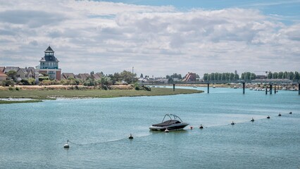 Obraz premium River with boat docked alongside