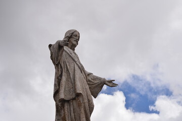 Low angle shot of a statue of Jesus Christ in the small town of Ayllon, Spain