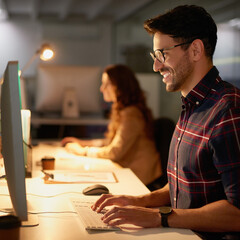 Computer, keyboard and man in night, office and overtime for project of web designer, creativity or...