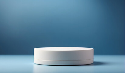 Empty round cylinder platform podium for product or cosmetics presentation on blue background with bokeh