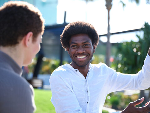 Man and woman having a conversation outside