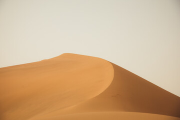 Mingsha Mountain and Crescent Lake in Dunhuang, Gansu Province - Desert scenery under clear sky