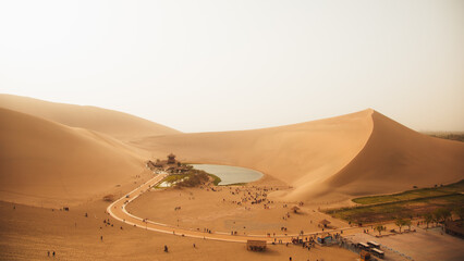 Mingsha Mountain and Crescent Lake in Dunhuang, Gansu Province - Desert scenery under clear sky